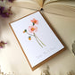 Carte postale représentant une fleur peinte à l'aquarelle - photo vue de coté